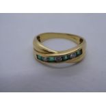 18ct yellow gold cross over design ring channel set with diamonds and emeralds, marked 750 size Q, g