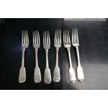 Four Irish Georgian silver forks by William Cummins and two others stamped P.W., possibly Philip Wee