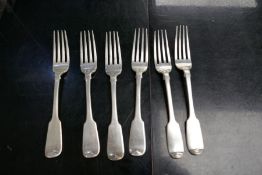 Four Irish Georgian silver forks by William Cummins and two others stamped P.W., possibly Philip Wee
