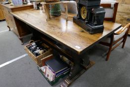 A reproduction oak oblong refectory table 175cm