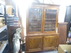 A Victorian mahogany bookcase having cupboard base, 141cm