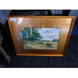 Two small coloured prints, glazed and framed depicting landscape scenes