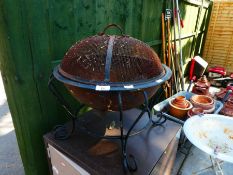 Small metal garden firepit