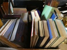 A box of old books to include bibles, Arabian Nights, maps, etc