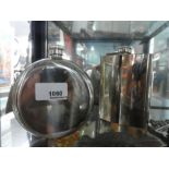 Three stainless steel hipflasks