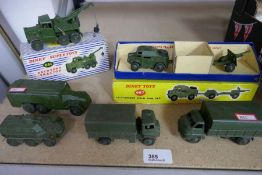 Dinky military vehicles to include a boxed recovery tractor, boxed Field gun set and 4 other unboxed