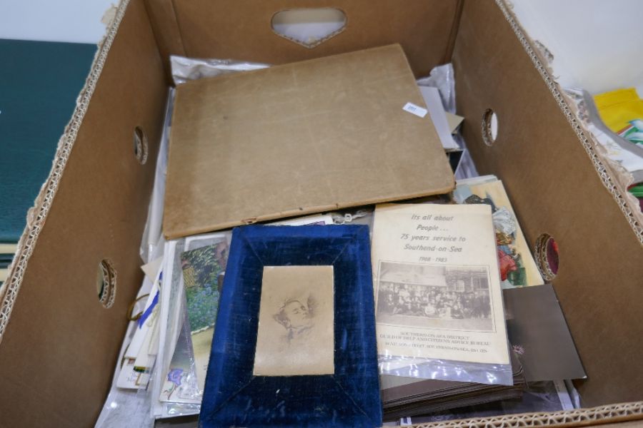 A tray of Victorian and later postcards, including one album many hundreds