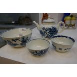 Four antique blue and white items bearing the early Worcester mark, including teapot, large bowl and