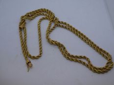 Yellow metal rope twist long necklace, 123cm, 125.9g, tested 9ct or higher