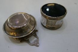 A silver tea strainer with two decorative handles hallmarked Thomas Bradbury and Sons Ltd 1915 - 16