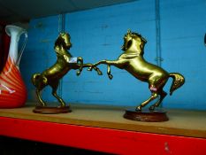 Two large scale horses on wooden plinths