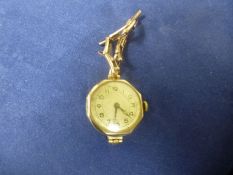A vintage ladies 9ct gold wristwatch stamped RWC watch bracelet also gold. Winds and ticks.