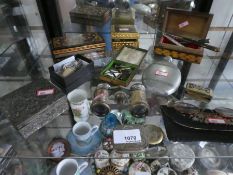 Shelf of collectables including inlaid trinket boxes, Mother of Pearl binoculars, coins, glasses, et