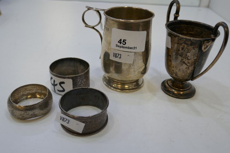 A silver lot comprising of a silver cup on raised pedestal foot, London 1921 Charles Boyton and Son