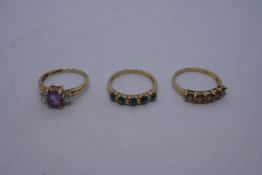 3 9ct yellow gold dress rings all stone set, one a blue tigers eye example, one citrine and the othe