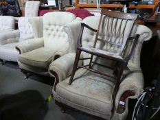 Pair of Victorian style button back fireside armchairs, upholstered in green and gold fabric on cast