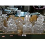 Two boxes of cut glass decanters, glass bowls and cake stand