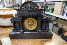 A Victorian black slate mantle clock having gilt dial 43cm