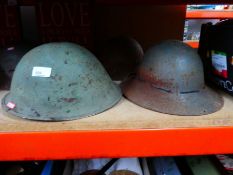 Selection of various metal military helmets British and European etc