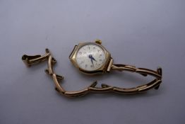 Vintage 9ct Buren Eldis 15 Jewel wristwatch in 9ct dennison case and strap, marked 375, gross 12.9g