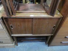 Mid century record cabinet with sliding doors and undertier together with a bank of 6 graduated draw