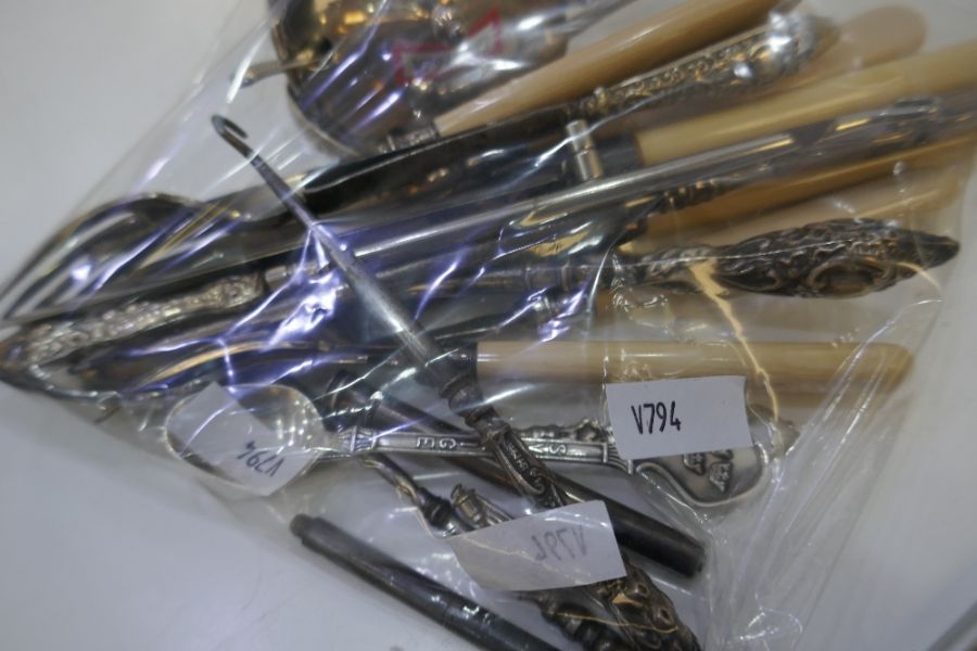 A large quantity of silver and plated items to include silver rim handled cutlery, silver salt, pen. - Image 4 of 4