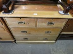 Stripped pine chest of 2 short and 2 long drawers with raised back