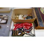 A small quantity of military shoulder badges, buttons, badges and similar