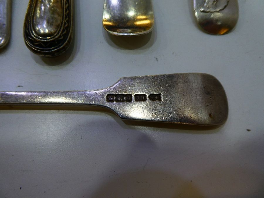 A lot comprising silver and white metal cutlery. To include a Georgian heavy silver spoon, London 18 - Image 3 of 10