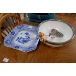 A Chinese blue and white square dish and an old salad bowl with servers on tomato feet