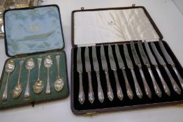 A cased set of twelve silver handled knives AF Sheffield Frank Cobb and Co Ltd 1938 possibly, a set