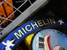 Two x curved Michelin signs