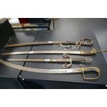 A Victorian sword having curved blade, another curved sword with steel scabbard and two others (4)