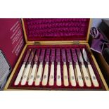 A set of 12 Victorian bone handled knives and forks in mahogany fitted case