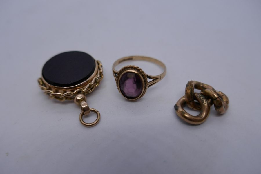 9ct yellow gold agate fob seal marked, & 9ct gold dress ring set with a purple stone