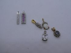 Collection of 9ct and 18ct pendants to include opal and diamond, pink sapphire and diamond, pale blu