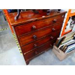A four drawer chest and a mahogany veneer and inlay