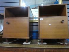 Pair of mid century bedside chests each with a cupboard by Avalon