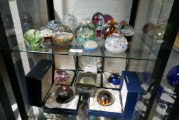 A quantity of paperweights to include Perthshire and Caithness limited edition