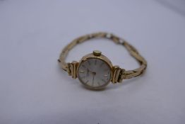 Vintage J W Benson 9ct yellow gold wristwatch on 9ct expanding strap, winds, minor surface scratchin