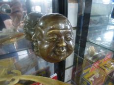 Four faced Buddha head