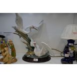 A Lladro figure of two Cranes no. 1456, 51cms high, on oval wooden base