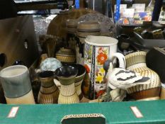 A quantity of various item to include steins, vases, pottery and china, fur hats, boxing gloves, ham