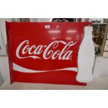 A Coco Cola advertising sign having spinning bottle, 65cm
