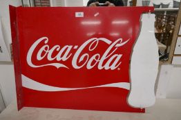 A Coco Cola advertising sign having spinning bottle, 65cm