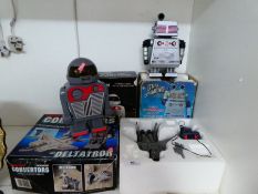 A selection of vintage radios in the form of robots, plus a motorised Convertortron