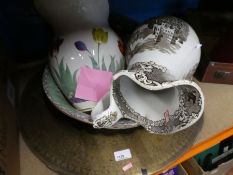 A box of small framed and glazed prints large tulip painted bowl and jug and another and brass plate