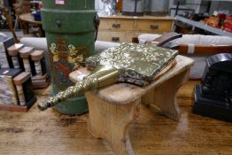 A green canvas shot bucket, a pine stool and a pair of bellows