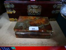 Two oriental made boxes with brass and jadeite inlay, plus an alabaster cigarette box