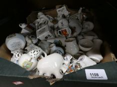 A small box full of crested ware